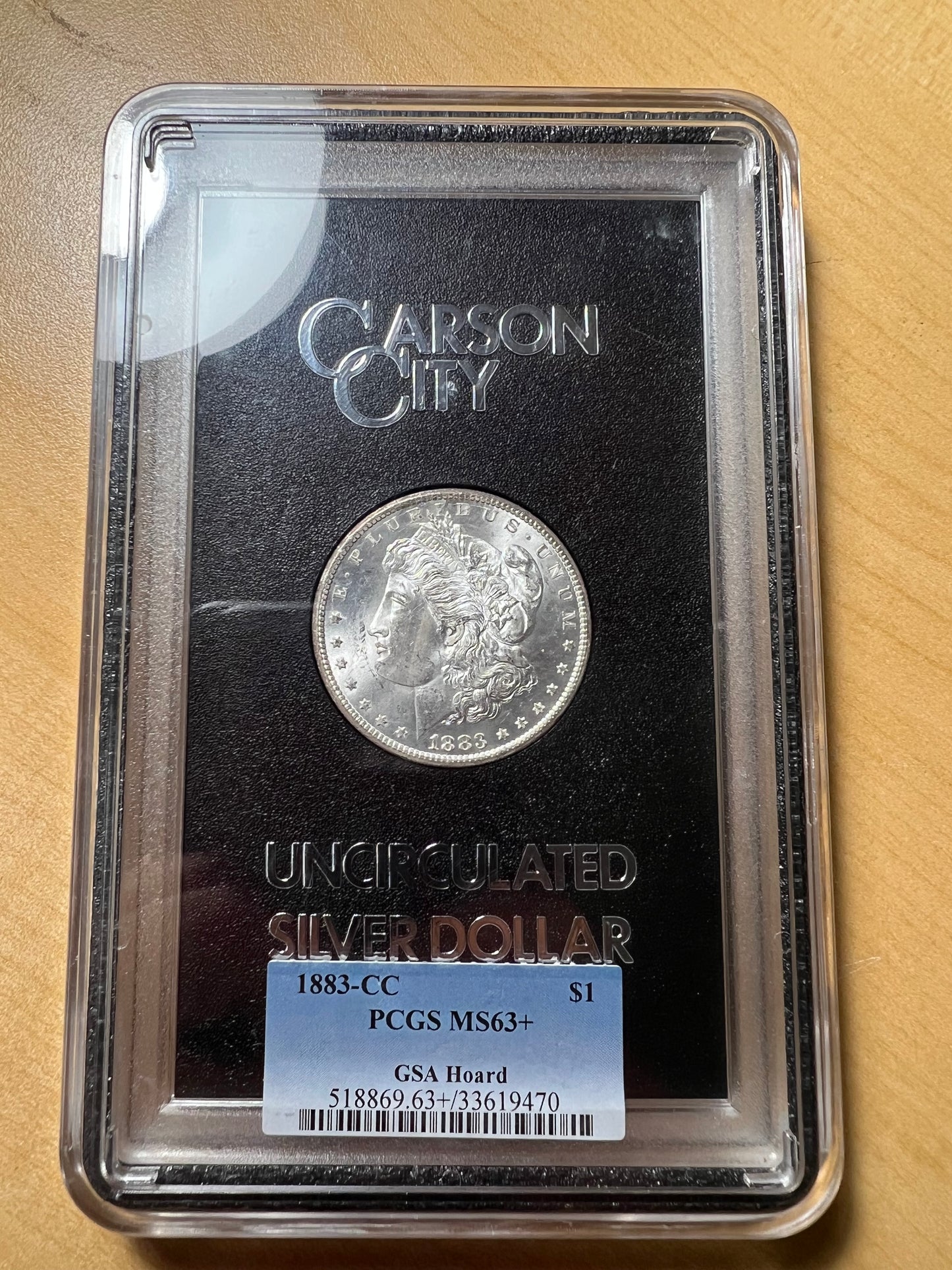 1883-CC $1 Morgan Dollar GSA Hoard PCGS MS63+