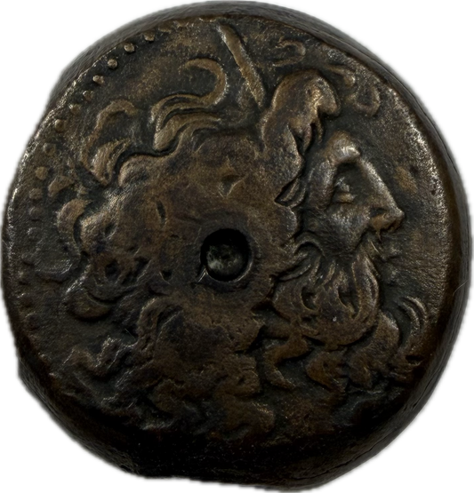 Obverse and reverse of an ancient Ptolemaic Egypt Bronze Diobol coin featuring Zeus-Ammon and two eagles